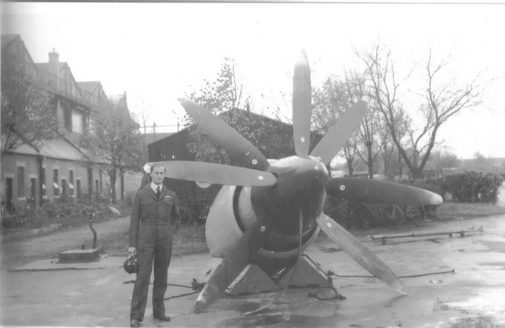 FLT LT Stoton stands in front of the remains of the Python one engine and props